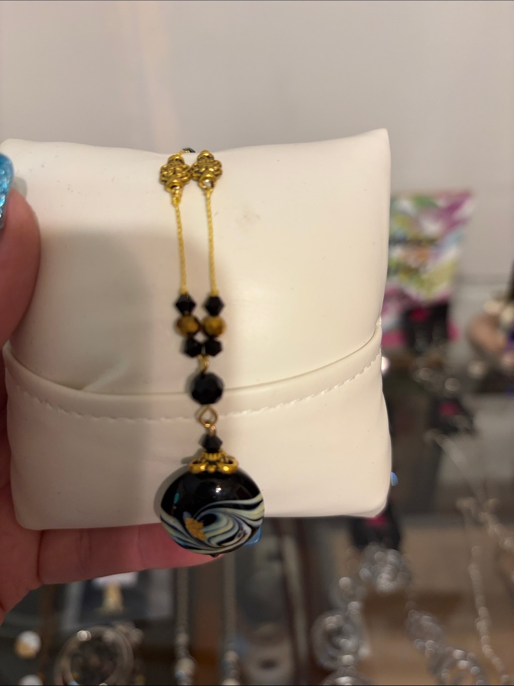 Gold-Tone Black Swirl Pendant Necklace